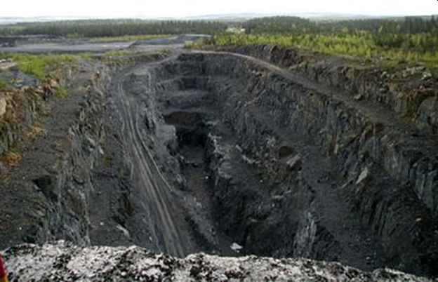 Open pit of 2001 closed Åkerberg Mine (photo from 2001 Erik Westerlund)